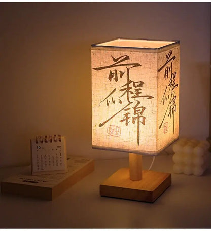 LED table lamp ambient glow with soft fabric shade, wooden base, and Chinese style design, perfect for bedside decor.