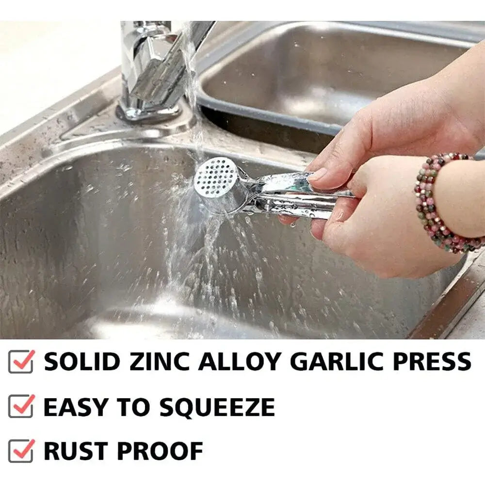Garlic Press – Silky Mince For Effortless Prep + Heavy-Duty Zinc Alloy Construction showing stainless zinc alloy garlic crusher rinsed under faucet, easy to squeeze
