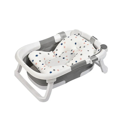 Foldable newborn baby bath tub with comfortable padding and a star pattern, designed for easy storage and baby comfort.