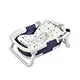 Foldable newborn baby bath tub featuring a comfortable design for sitting and lying positions in a compact form.