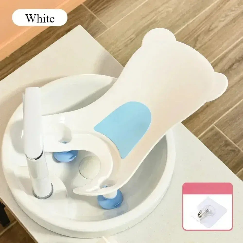Non-slip baby bath seat in white color, featuring secure suction cups and soft silicone pad for safety during bath time.