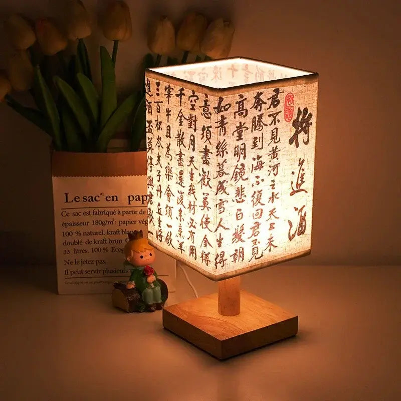 LED table lamp ambient glow with a fabric lampshade and wood base, providing a warm, inviting light for modern spaces.