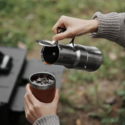 Stainless Steel Moka Pot – Rich Coffee + Foldable Handle pouring fresh moka coffee into a camping cup, 350ml compact stainless steel