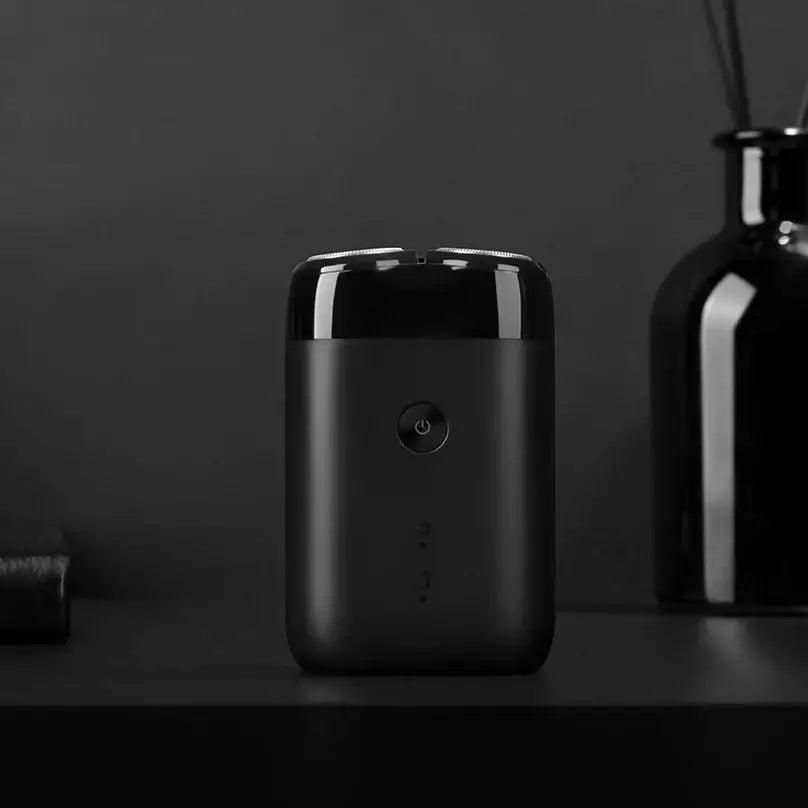 XIAOMI MIJIA S100 electric shaver with twin blades, portable USB rechargeable, dry/wet, matte black.