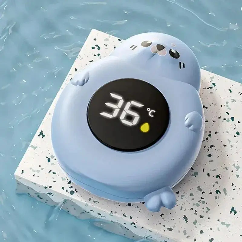 Baby Bath Thermometer - Accurate Readings + LED Display: blue seal-shaped digital tub thermometer showing 36°C on LED screen
