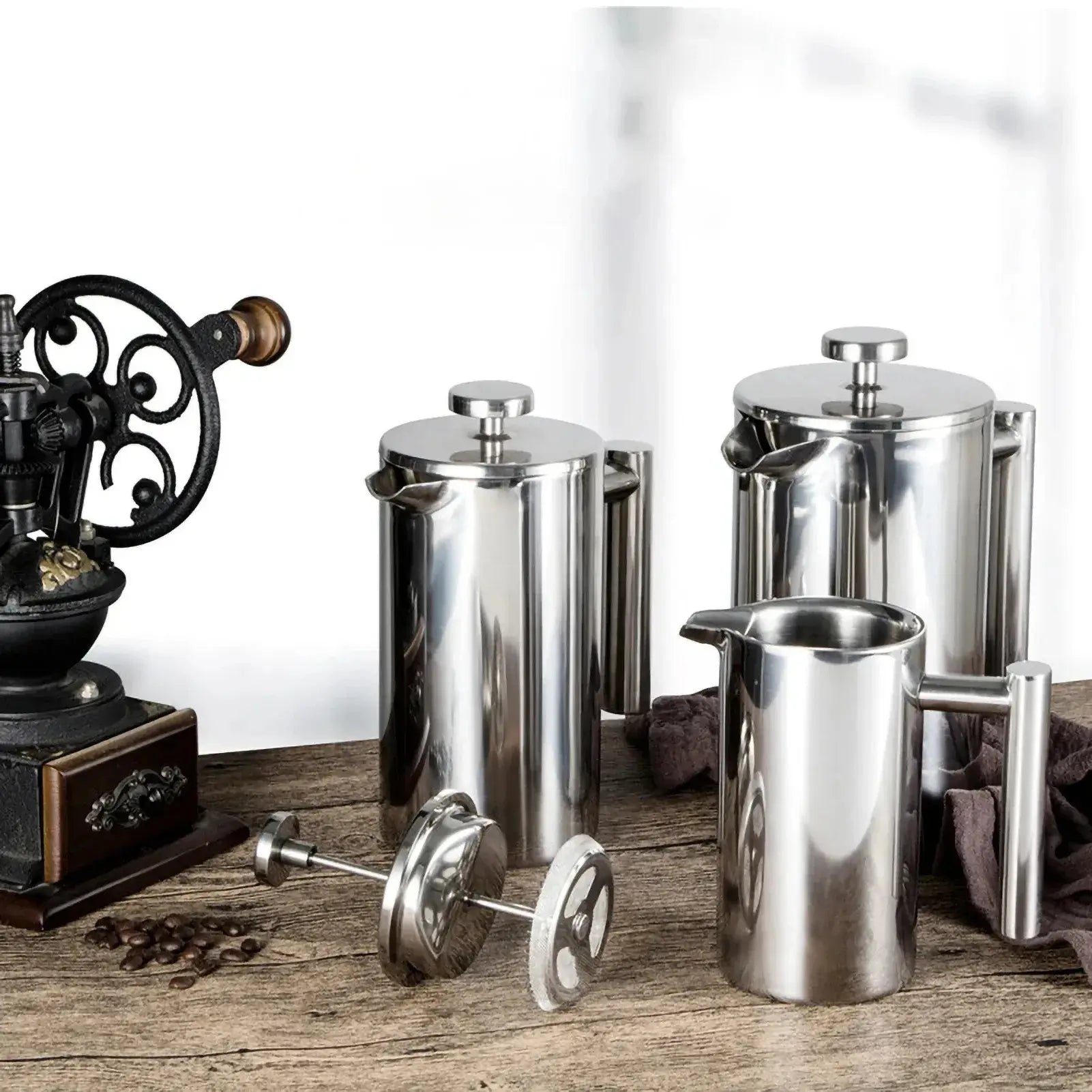 French Press – Longer Heat Retention For Hot, Aroma-Packed Brews + Double-Walled Stainless Steel stainless steel 1.0L French press set on wooden table