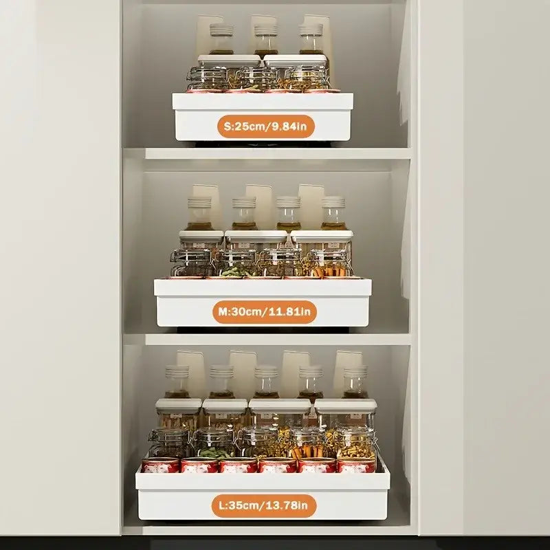 Slide Out Cabinet Organizer No Drill Magic Tray Heavy Duty Space Saver Under Sink – three white sliding trays holding spice jars in a cabinet