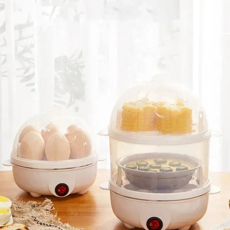 Fast electric egg and veggie cooker with double-layer design, steaming eggs and corn in a kitchen setting.