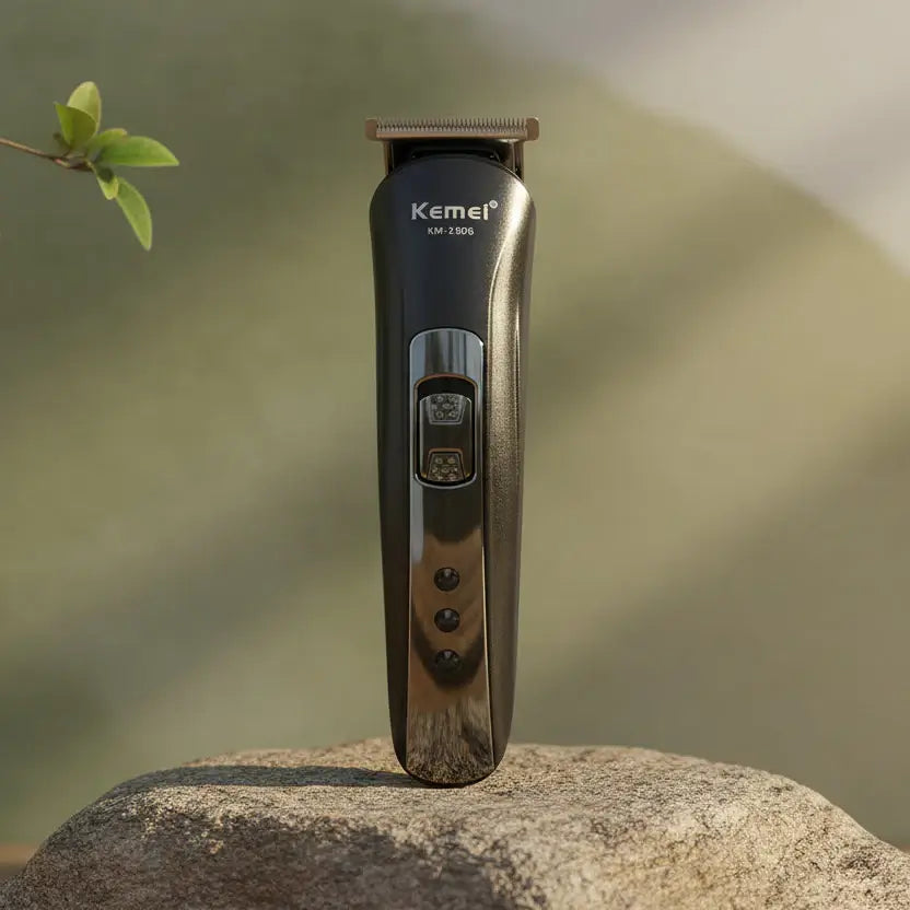 Kemei hair trimmer set with attachments and packaging on a white background