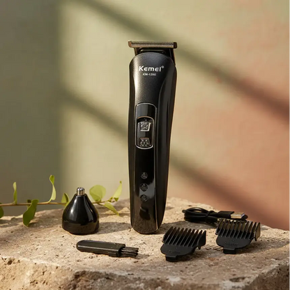 Kemei hair trimmer set with attachments and packaging on a white background