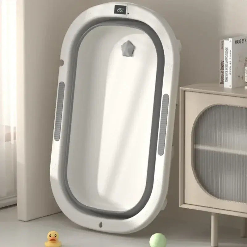 Foldable baby bath tub for toddlers, designed for sitting and lying postures, ideal for household bathroom use.