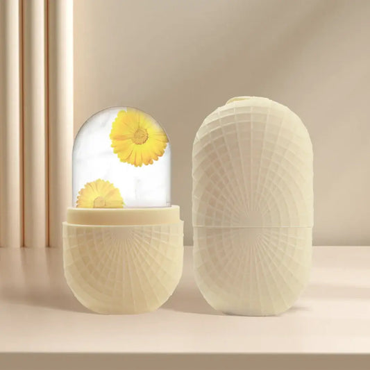 Premium Face Ice Roller For Face And Eyes – Cooling + Leak-Proof Silicone Ice Mold shown open with ice and yellow flowers for under-eye and facial cooling