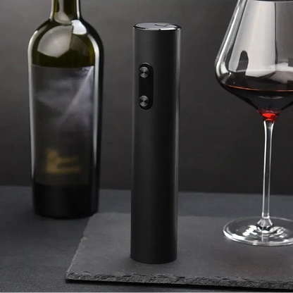 Product display of electric wine opener set next to a wine bottle and glass, showcasing its sleek design.