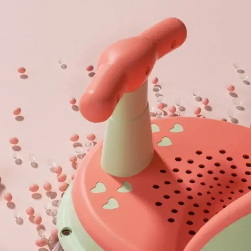 Anti-Slip Baby Bath Seat With Suction Cup Base and Detachable Armrests detail showing handle and heart designs.