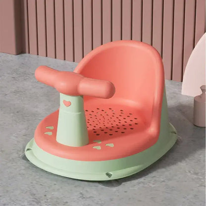 Anti-Slip Baby Bath Seat With Suction Cup Base and Detachable Armrests in pink and green design.