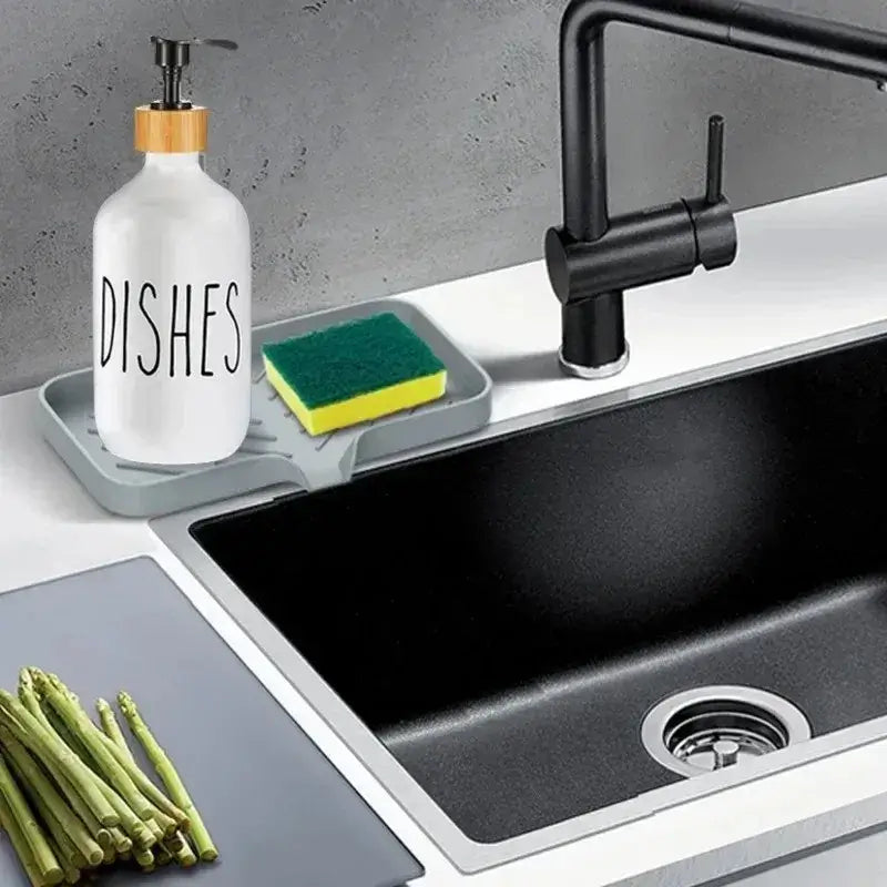 Kitchen Sink Sponge Holder – Dries Sponges Faster + Self-Draining Silicone Tray System on countertop holding sponge and soap bottle