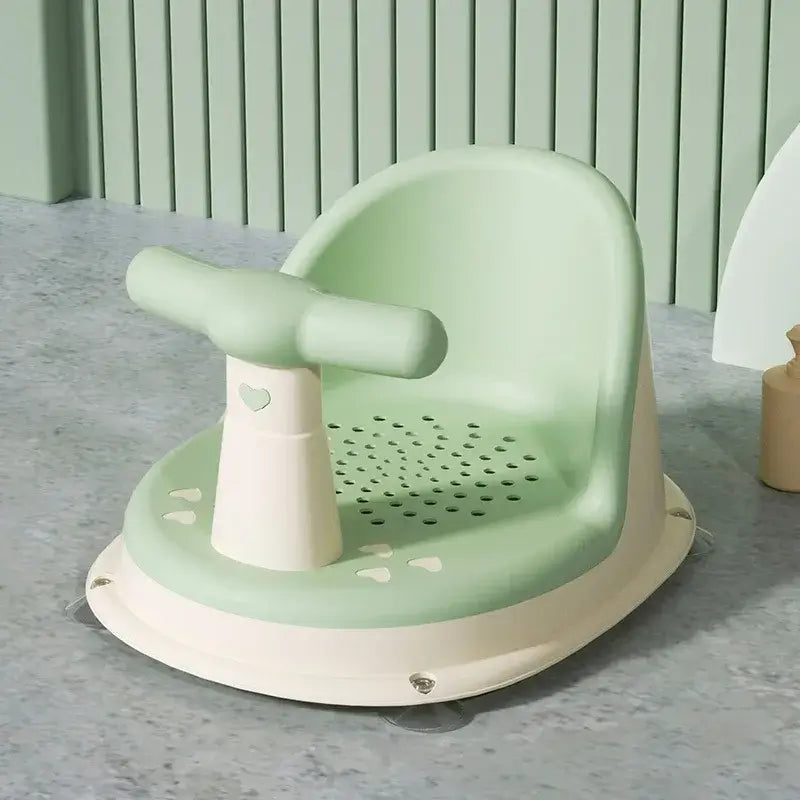 Anti-Slip Baby Bath Seat With Suction Cup Base and Detachable Armrests in light green design.