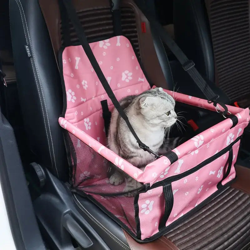 Pet Booster Seat – Safer Rides + Adjustable Seat Belt pink breathable car booster with cat secured by adjustable straps