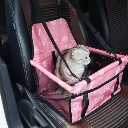 Pet Booster Seat – Safer Rides + Adjustable Seat Belt pink breathable car booster with cat secured by adjustable straps