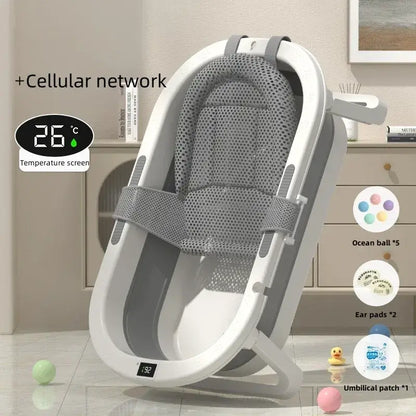 Foldable baby bath tub for toddlers with temperature screen and accessories like ear pads and ocean balls.