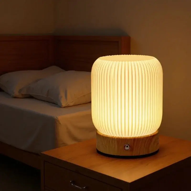 Rechargeable Cordless Mood Lighting For Bedroom And Living Room - A soft glow bedside lamp on a nightstand.