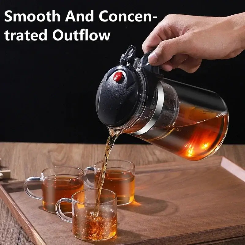 Glass Teapot 1L – Rich Aroma + One-Click Filter System pouring clear tea with one-click filter and heat-resistant glass