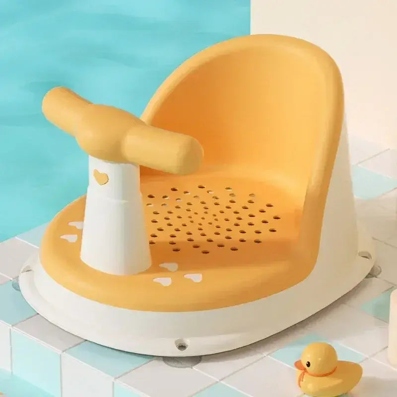Anti-Slip Baby Bath Seat With Suction Cup Base and Detachable Armrests in yellow color next to a rubber duck.