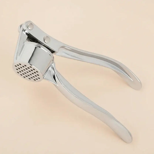 Garlic Press – Silky Mince For Effortless Prep + Heavy-Duty Zinc Alloy Construction stainless steel garlic crusher showing heavy-duty zinc alloy press