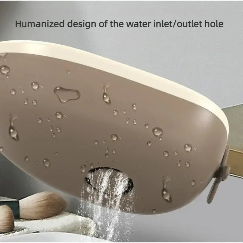 Digital baby bath thermometer featuring a humanized water inlet/outlet hole design with water flowing and droplets.