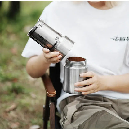 Stainless Steel Moka Pot – Rich Coffee + Foldable Handle showing camp-ready 350ml moka pot with grounds and foldable handle