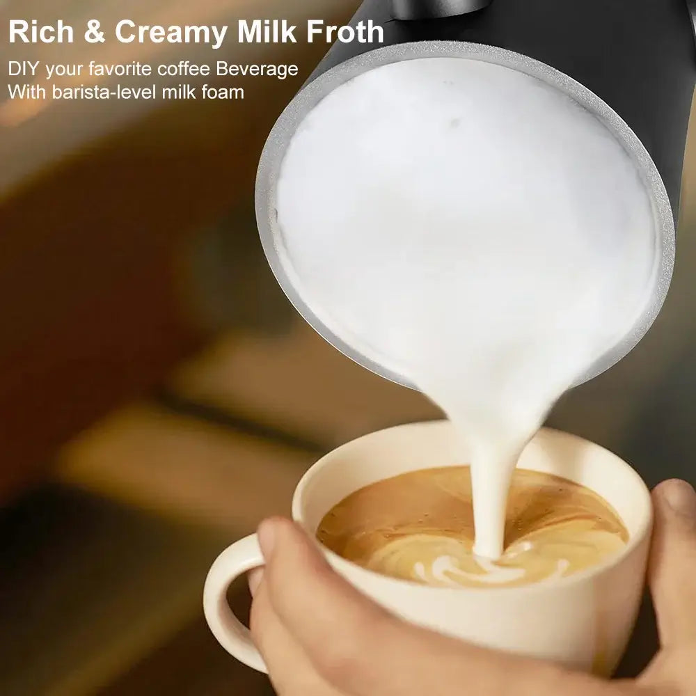 Milk Frother - Café-Quality Foam In Seconds + 4-In-1 pouring rich creamy hot milk froth into a latte cup