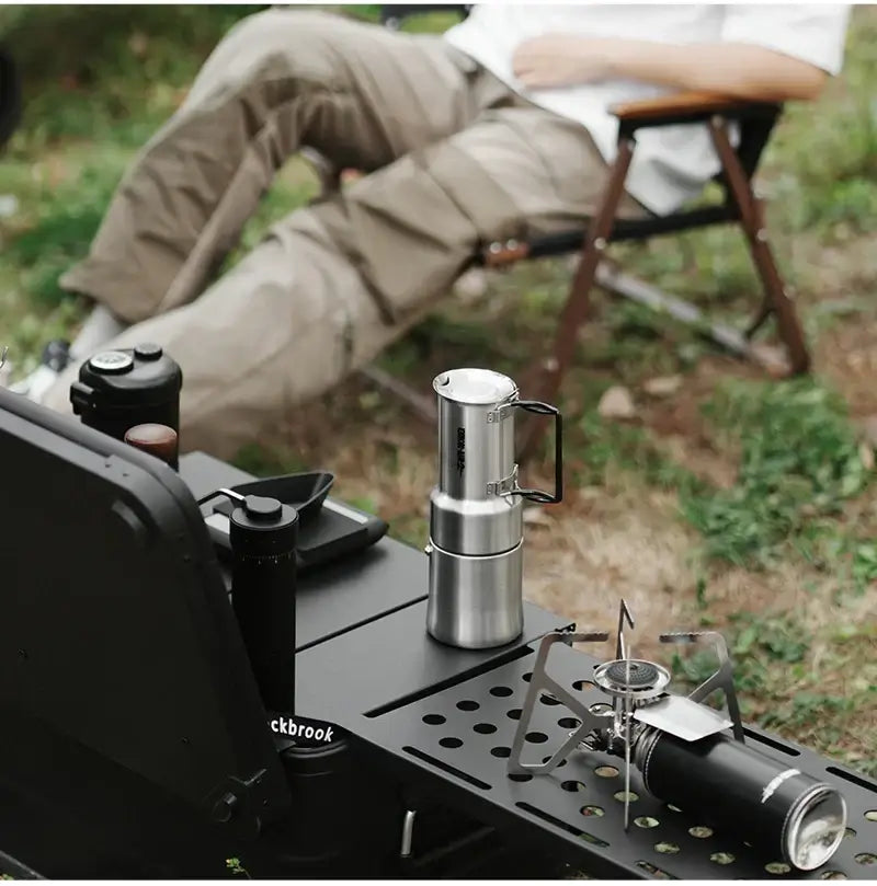 Stainless Steel Moka Pot – Rich Coffee + Foldable Handle on camp stove beside camping gear, 350ml outdoor moka pot