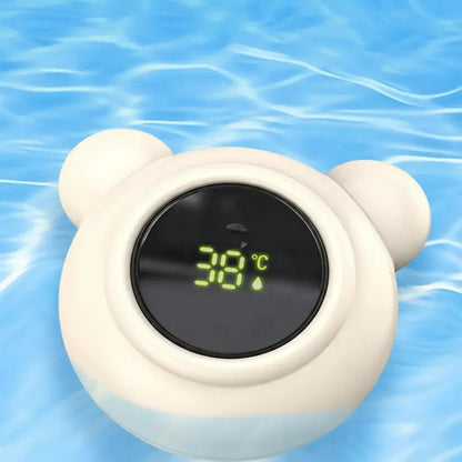 Baby Bath Thermometer – Safe Bath Time + Digital LED Display Waterproof Floating Duck Toy showing 38°C on LED display floating in pool