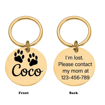 Dog Tag – Permanent Engraving For Legibility + Stainless Steel Quick Release Attachment: gold circular pet tag with paw print, engraved name ‘Coco’ and contact number