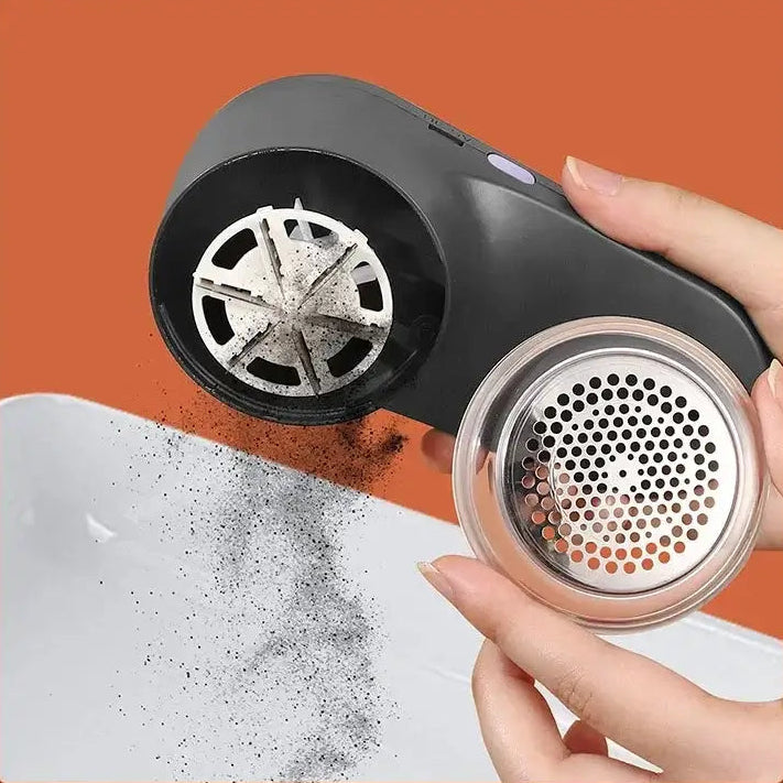 USB rechargeable fabric shaver with LED display removing lint and fuzz from fabric.