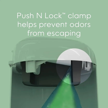 FreshNest Odor Locking Diaper Pail Gift Set With Extra Refills showing Push N Lock clamp preventing odors