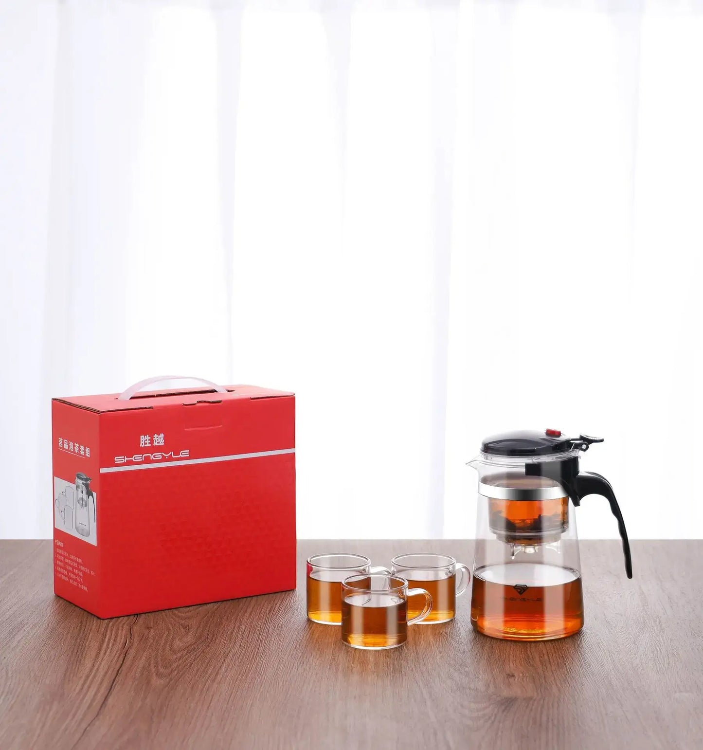 Glass Teapot 1L – Rich Aroma + One-Click Filter System glass teapot with three cups and red box on table