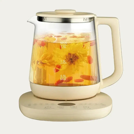 1.5L cordless electric glass kettle fast boil with transparent design, brewing tea and herbs on a stylish base.