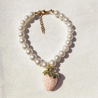 Pet Collar With Pearl Necklace - Pet-Safe Comfort + Lightweight Resin Design For Everyday Wear, pearl beads with strawberry pendant on white background
