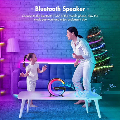 Mini G LED Cord-Free Desk Lamp with Wireless Charging and Speakers in a vibrant living room with Bluetooth speaker