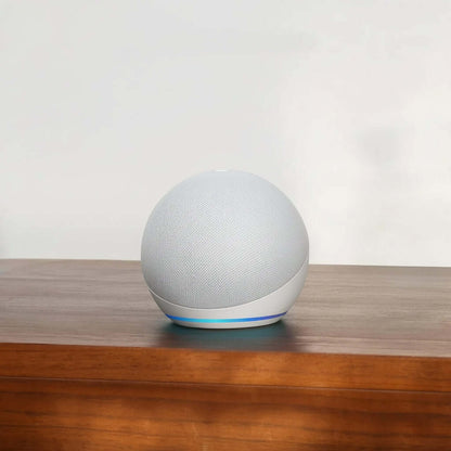 Echo Dot 5th Gen smart speaker on a wooden table, showcasing its sleek design and superior sound quality.