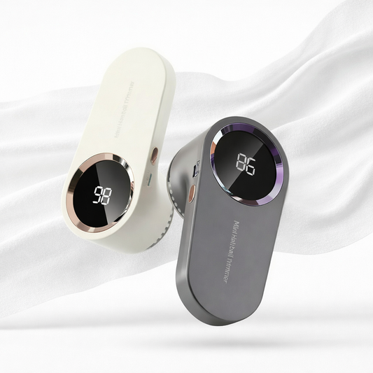 USB rechargeable fabric shaver with LED display in white and gray colors on a soft background.